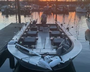 A boat docked in Astoria, perfect for salmon fishing.